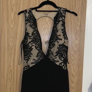 Black and nude maxi dress with slit. Size 3